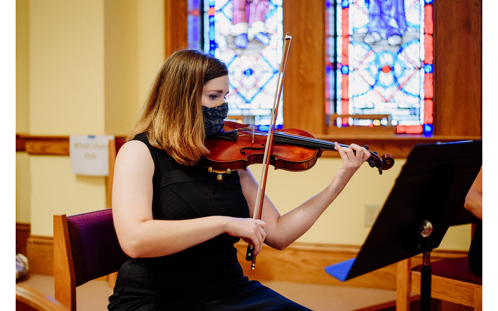 Mallory holding violin